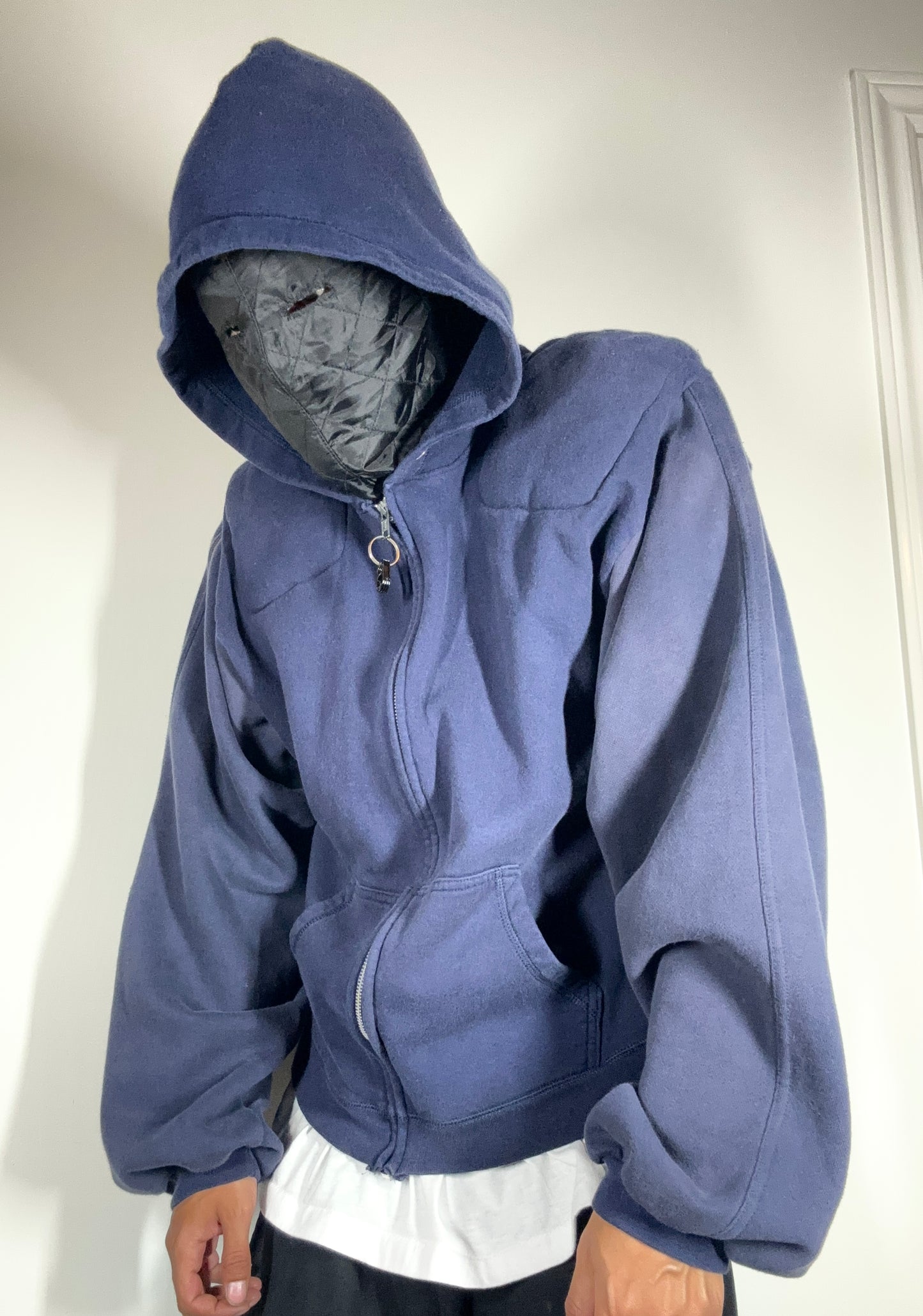 Machine traveler zip up