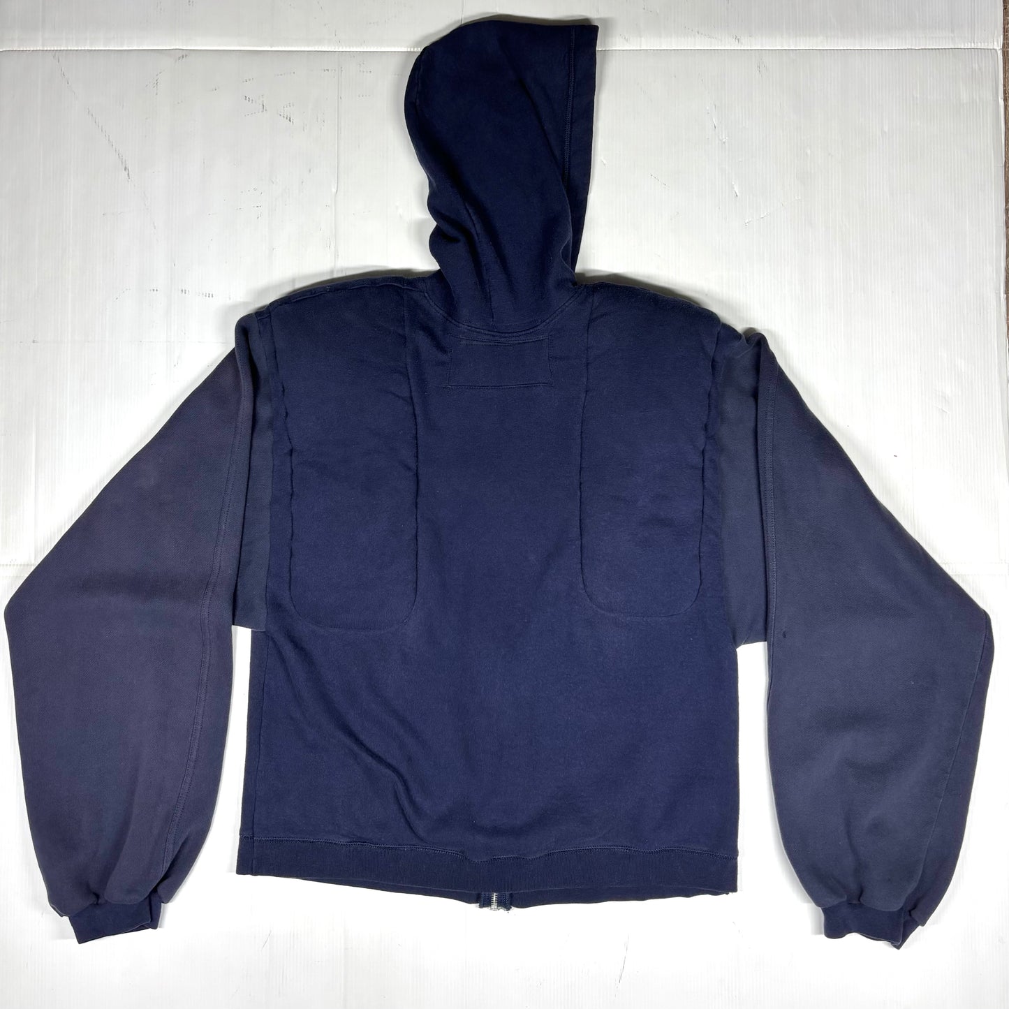 Machine traveler zip up