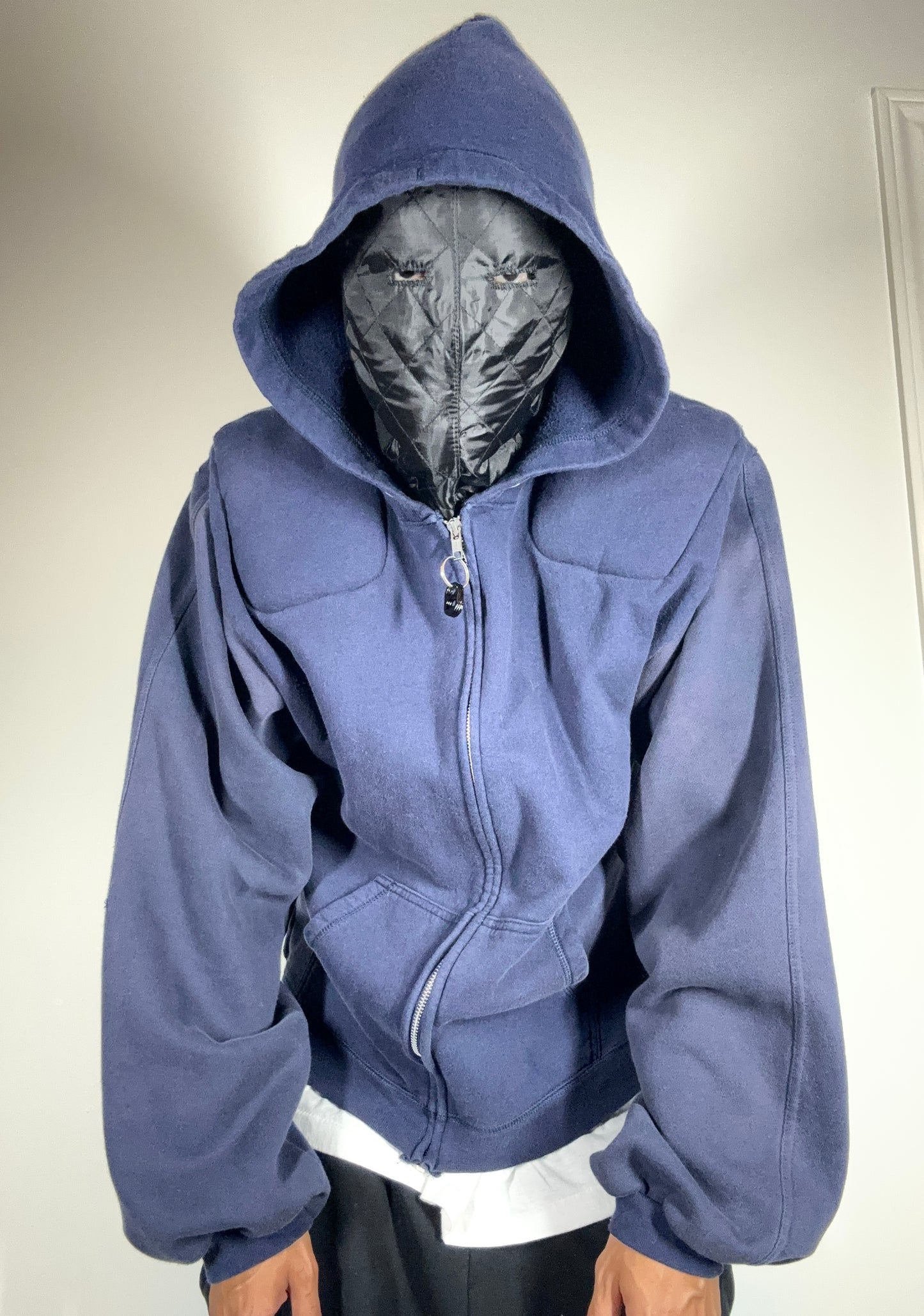 Machine traveler zip up